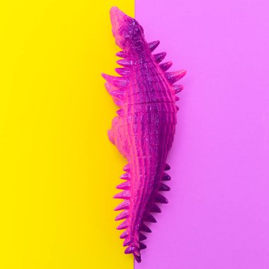  Renkli bir arka plan üzerinde Dinozorlar oyuncaklar. Düz yatıyordu minimal sanat