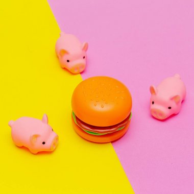 Domuzlar ve Burger. Gıda. Sağlıksız yiyecekler. Kalori kavramı