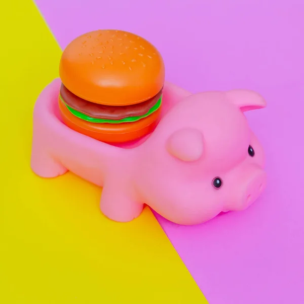 Cerdo y hamburguesa. Comida. Comida poco saludable. Concepto de calorías — Foto de Stock