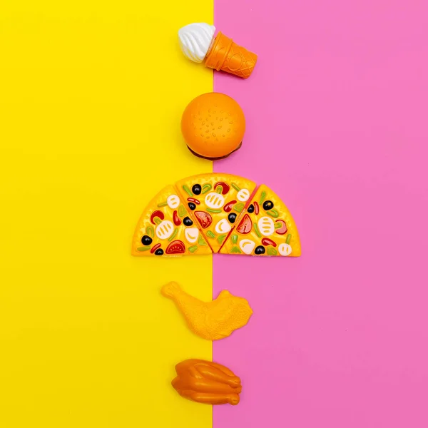 Toy junk food on colored background. Fast food flat lay minimal