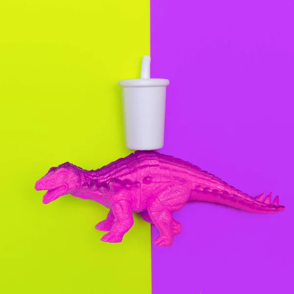 Plastic dinosaurs love soda. Minimal flat lay art — Stock Photo, Image