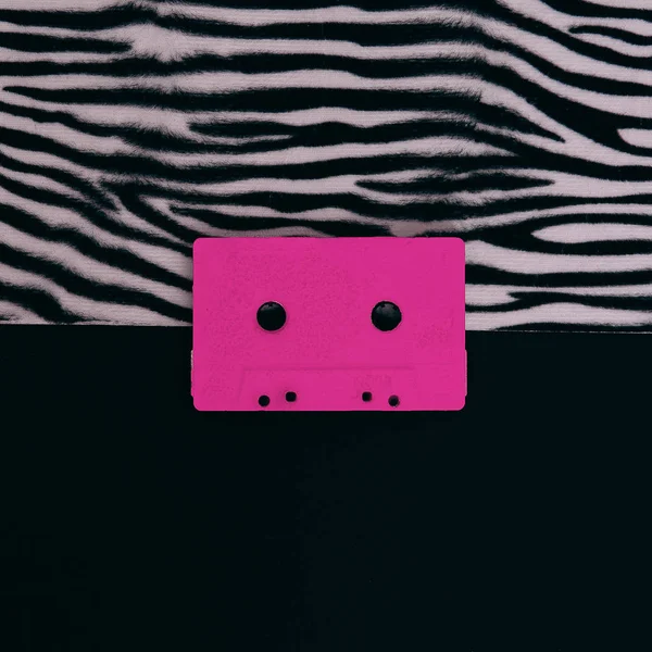 Pink Audio Cassette en animal zebra print. Arte laico plano mínimo — Foto de Stock