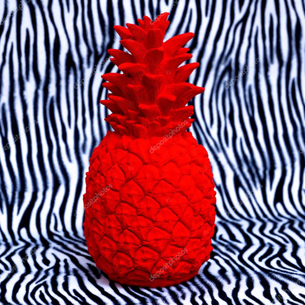 Red pineapple on zebra print. Minimal creative art