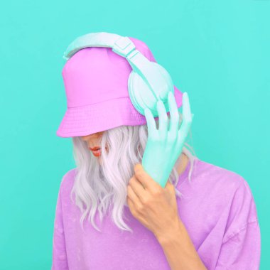 Fashion Dj Girl in stylish headphones and bucket hats. Minimal monochrome vanilla pastel colours  trends