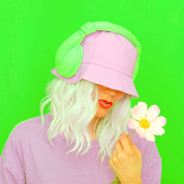 Summer Dj Girl in stylish headphones and bucket hats. Minimal monochrome green colours  trends