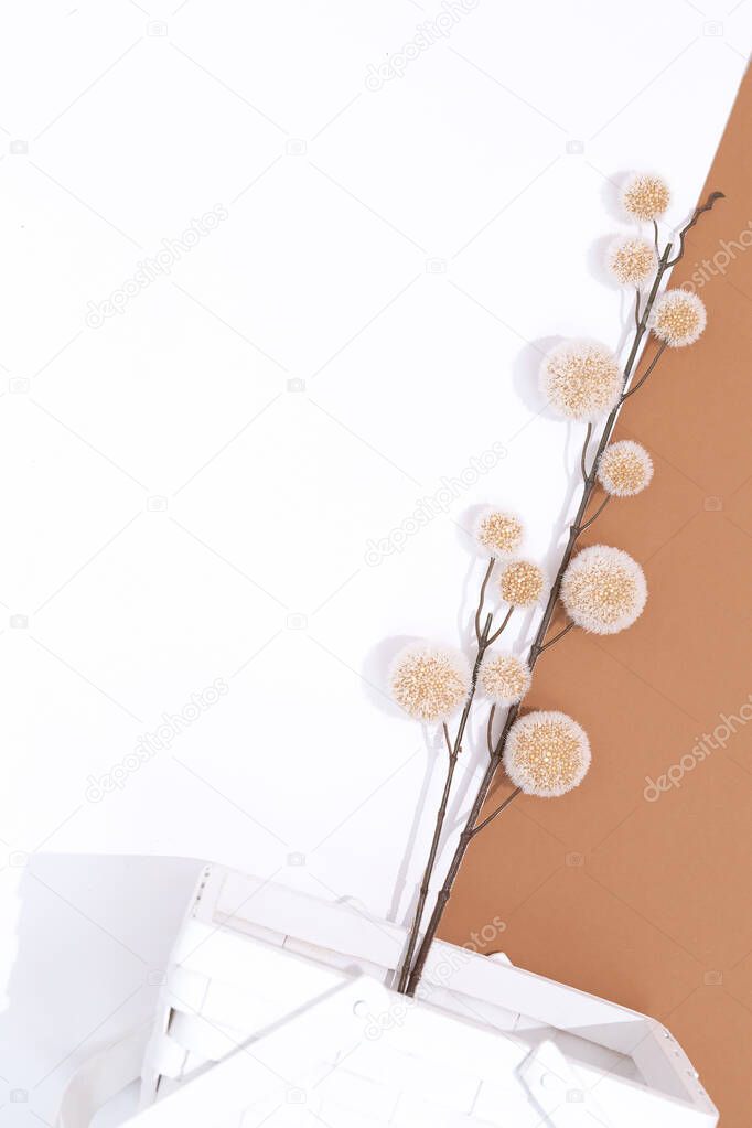 Minimal autumn composition White Basket with  winter flowers. Still life fall winter concept art
