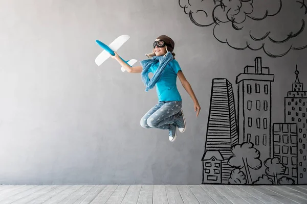 Child Pilot Jumping Kid Having Fun Home Success Creative Idea — Stock Photo, Image