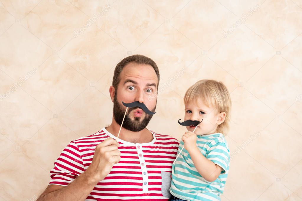 Man and child at home. Father and son having fun together. Family holiday concept. Happy Father's day