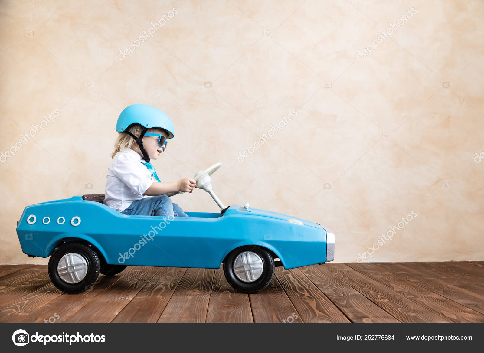 kids driving toy cars