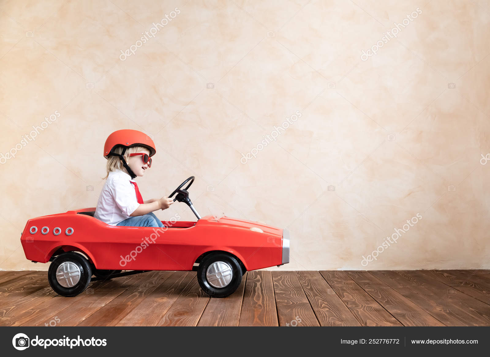 kids driving toy cars