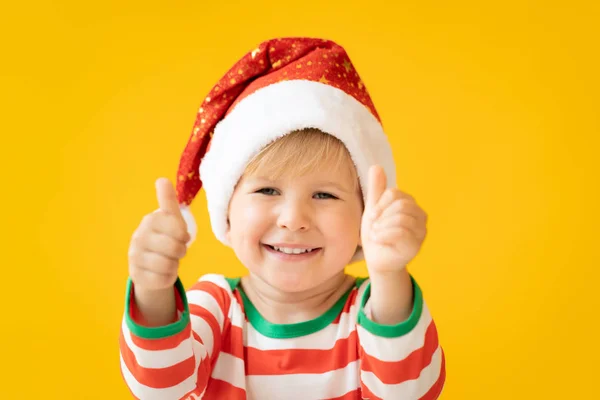 Portrait of happy child showing thumbs up — Stock Photo, Image