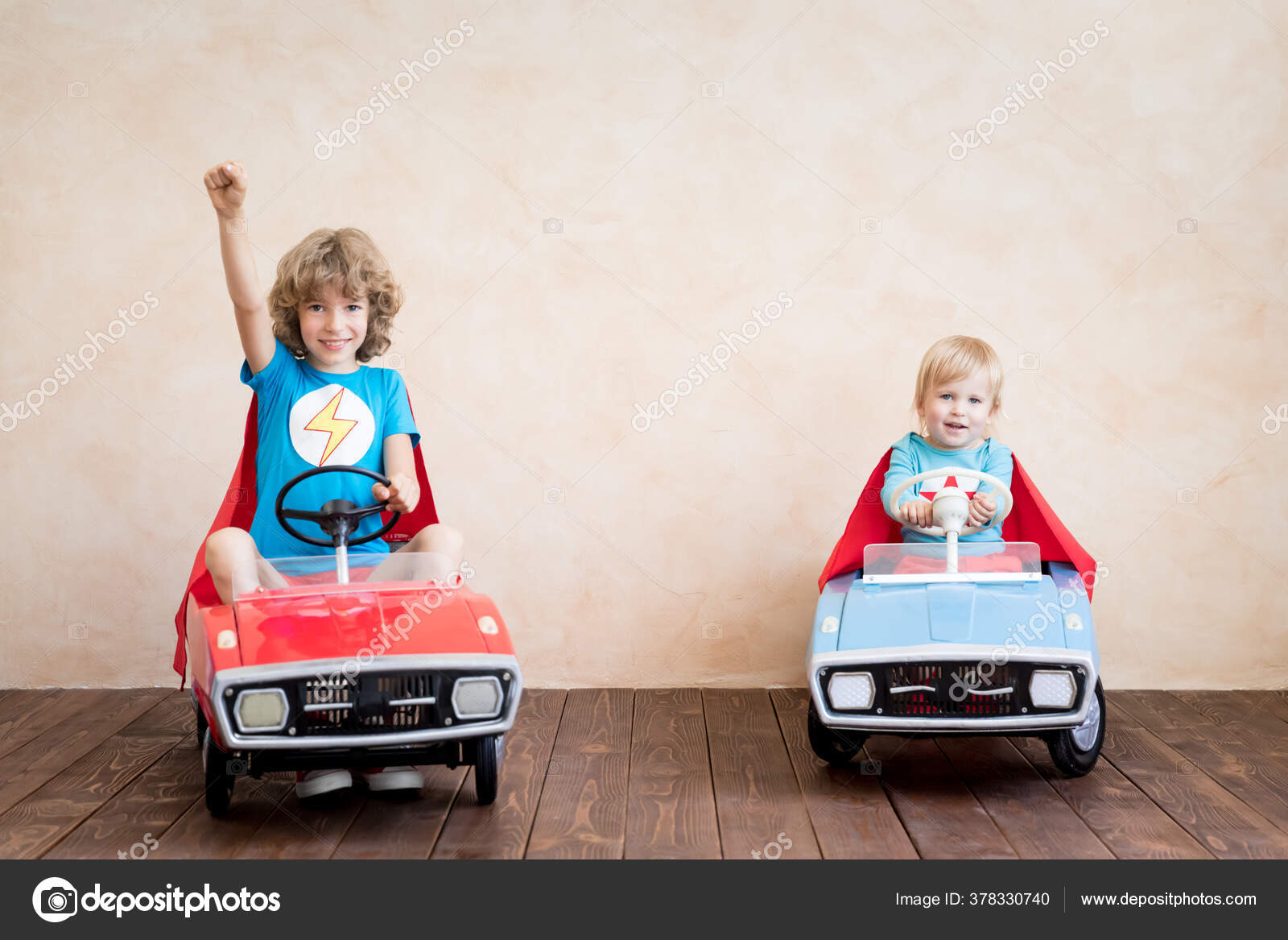 kids driving toy cars