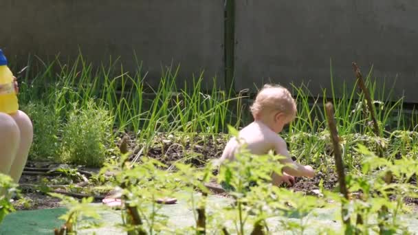 Son with Mother Blow Bubbles — Stock video