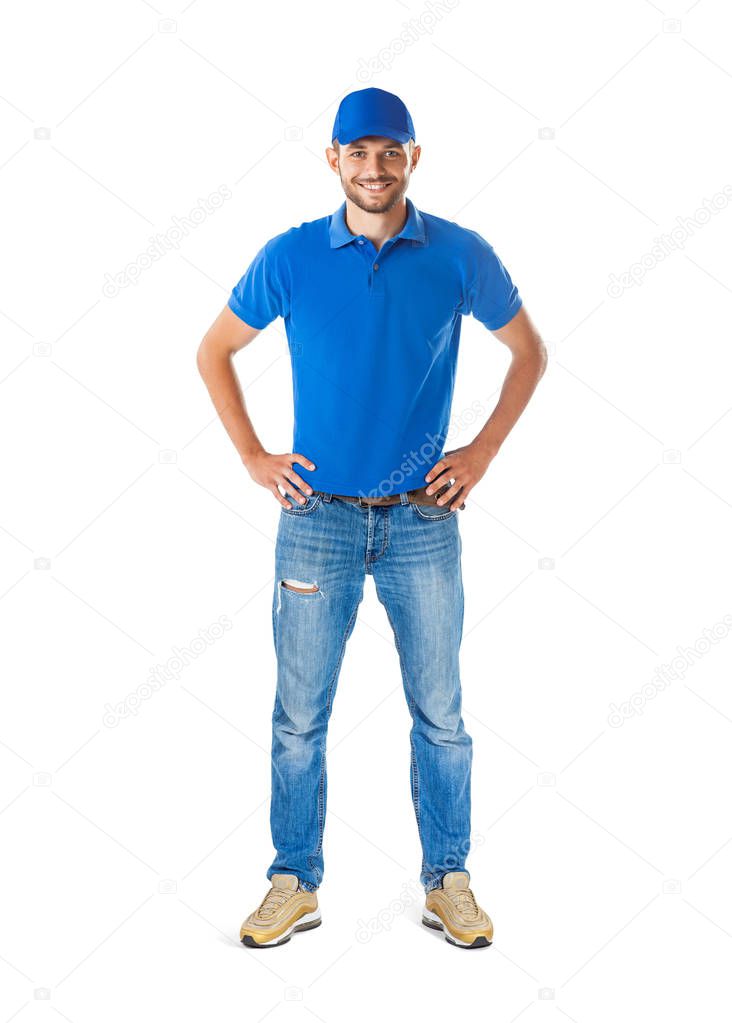 Full length portrait of confident handsome man in blue uniform isolated on white background