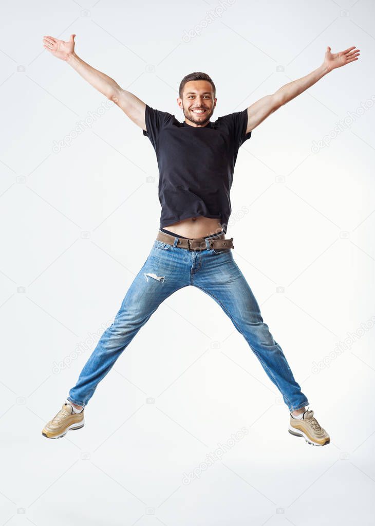 Happy excited man jumping. Carefree and fun concept