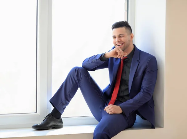 Handsome Laughing Business Man Relaxing Window Sill — Stock Photo, Image