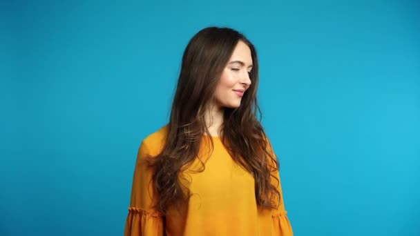 Beautiful Young Woman Shaking Head Long Hair Slow Motion Blue — Stock Video