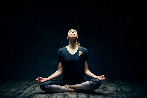 Young Attractive Woman Practicing Yoga Sitting Lotus Pose Meditating Dark — Stock Photo, Image