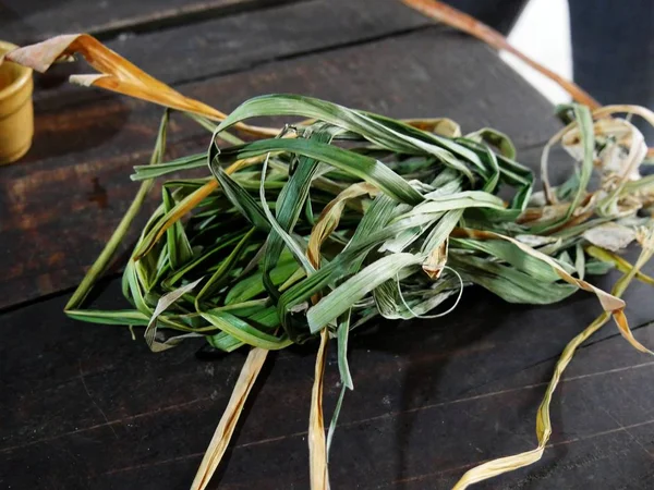 Dried lemon grass on a table. Lemon grass is used as a cooking ingredient to add flavors to the food.