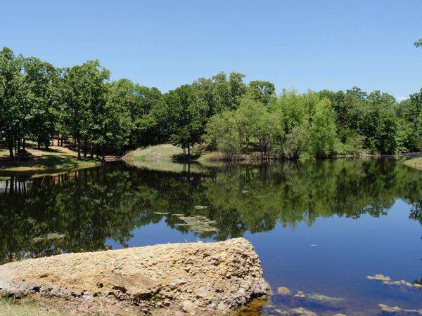 Scneic view of a small lake at the Chickasaw National Recreation Area in Davis, Oklahoma