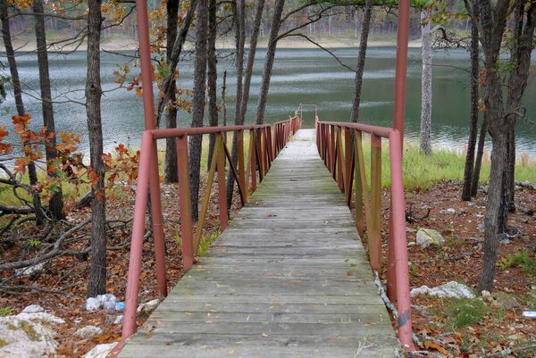 Panoramic view of colorful leaves of the trees along the Mountain Fork River at the Beavers Bend State Park in Broken Bow, Oklahoma