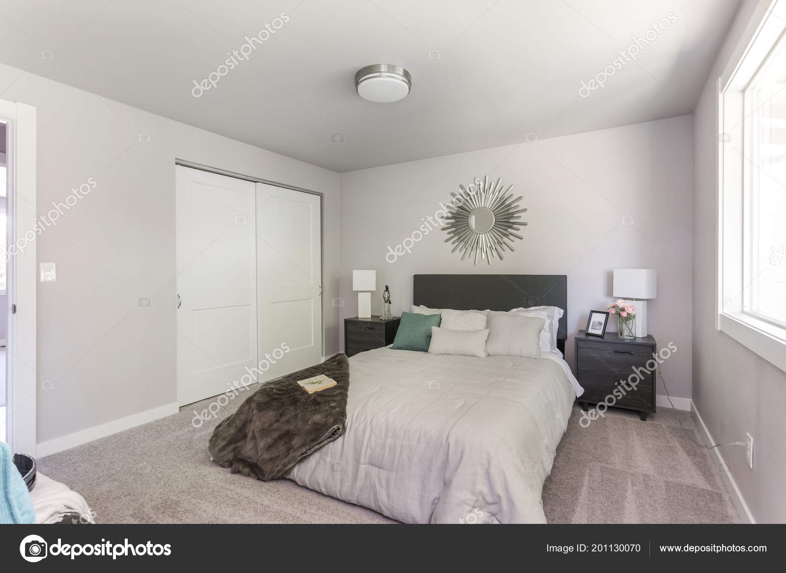 Tidy Modern Bedroom Interior Double Bed White Closet Doors