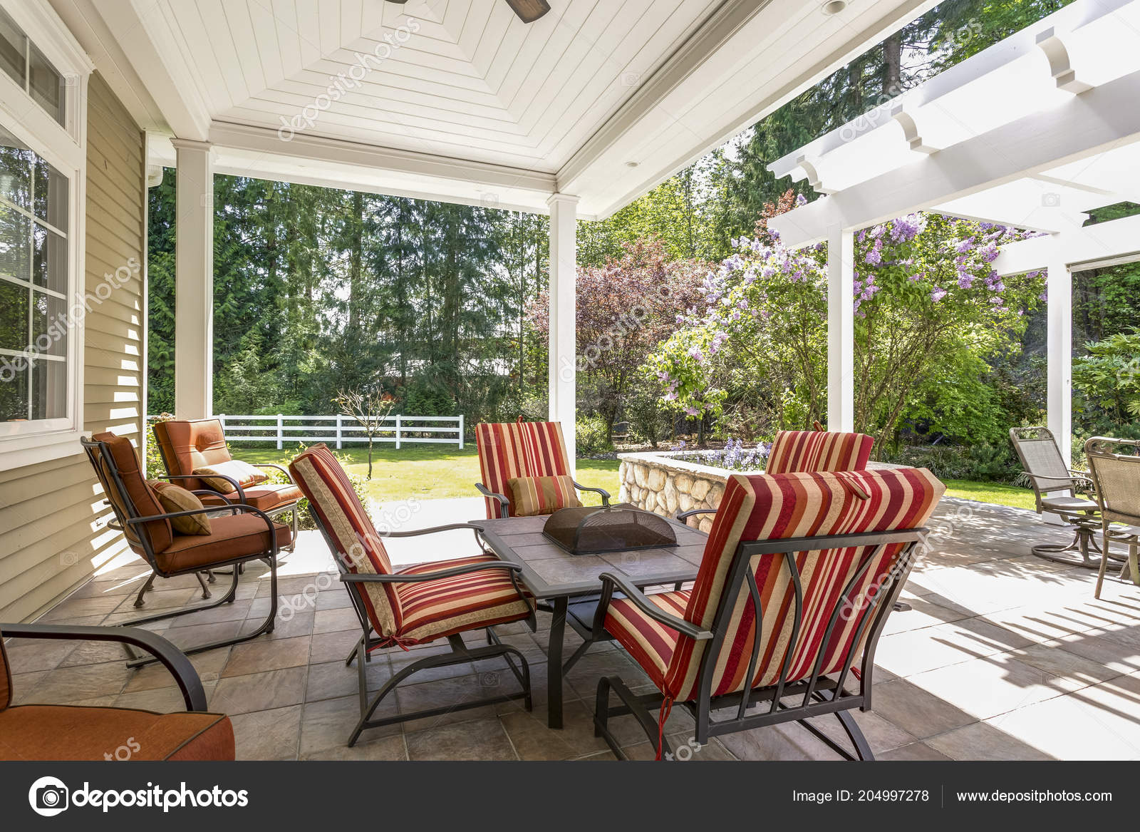 Spacious Covered Deck Area Table Red Outdoor Chairs White Plank