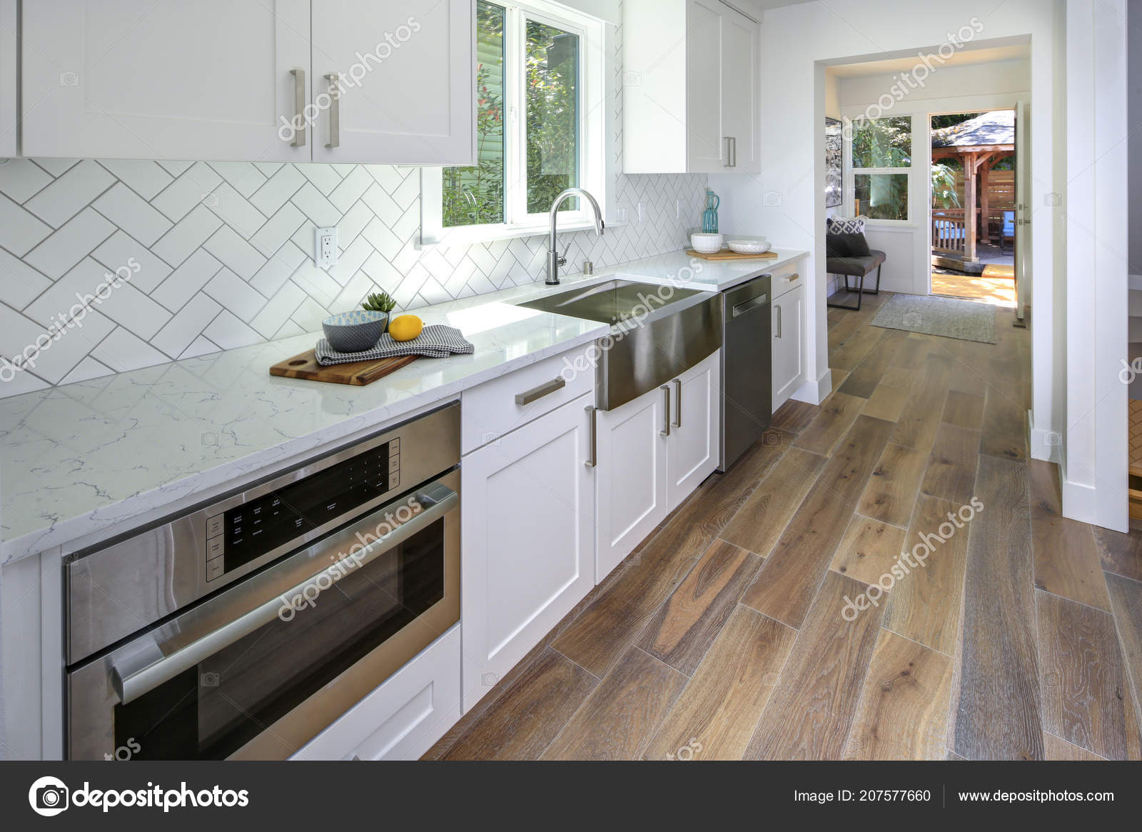 Remodeled Kitchen Pure White Cabinets Marble Countertops