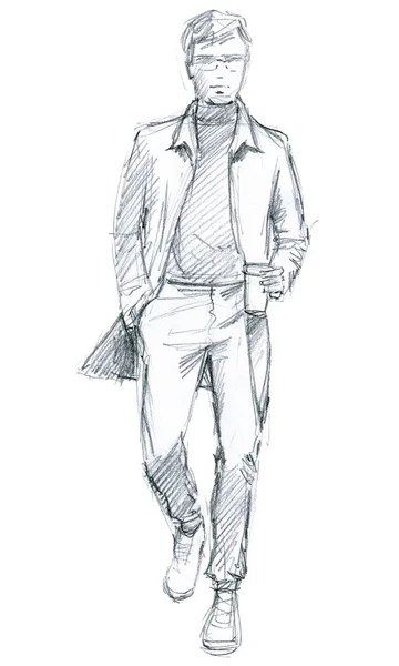 Νεαρός άνδρας σε casual ρούχα. Έρχεται με τον καφέ στο χέρι — Φωτογραφία Αρχείου