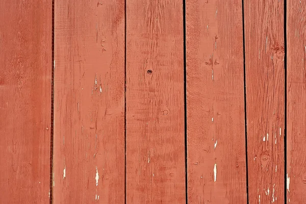 eski tahta dokusu. kırmızı boya bağcıklı. tahta üzerinde yıpranmış kurulu güneş ışığı.