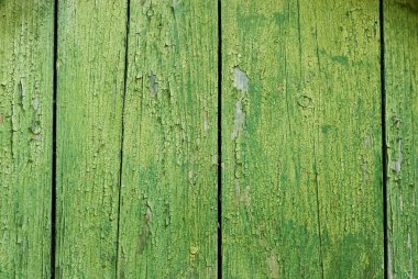 Kırık yeşil boyalı eski ahşap dokusu