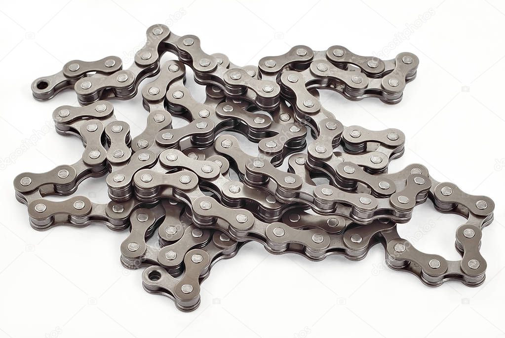 Three bicycle chains on white background, ready for cut and paste