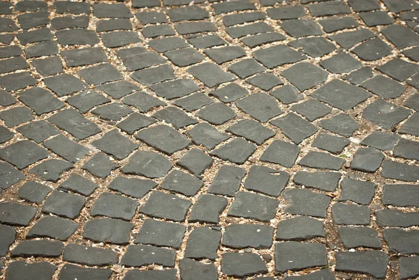 空の通りのタイルの質感 石畳のクローズアップ 花崗岩のタイルのシャープネス デザインのためのレイアウト エリアは下の角度から削除されます — ストック写真