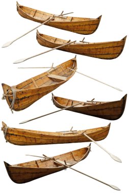 Wooden replica of a viking boat. Reconstruction of historic ships and boats. Wooden ship isolated on a white background. Medieval fishing boat with oars in different angles. clipart