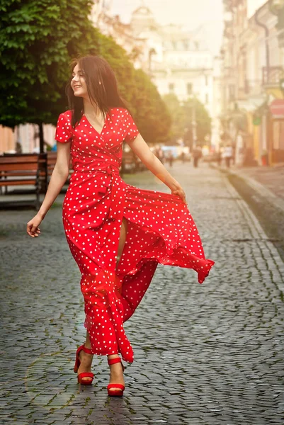 Happy Girl Walks Street Cobblestones Woman Red Dress White Spots — Stock Photo, Image