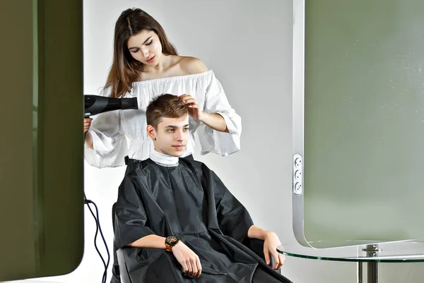 Girl Makes Hairstyle Guy Hairdresser Beauty Salon Hair Dryer His — Stock Photo, Image