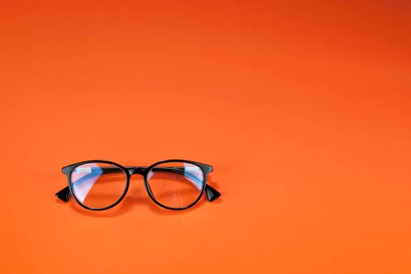 Distintos Tipos Vasos Sobre Fondo Naranja Cierran Gafas Con Monturas — Foto de Stock