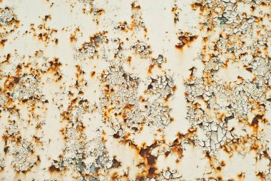 Eski metal bir çitin dokusu. Sarı boyalı metal bir levha..