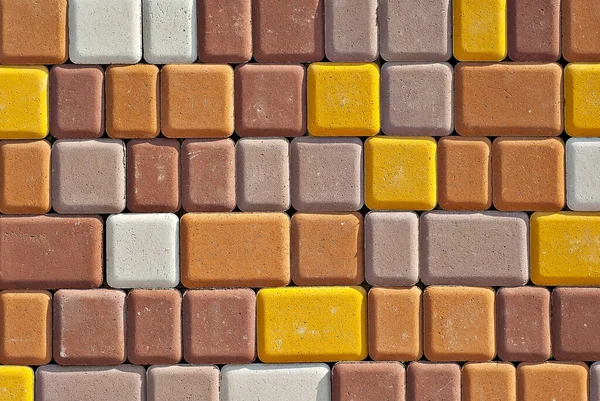 石畳の質感 歩道のタイルは均等に折り畳まれています 茶色とオレンジの石畳が閉じます — ストック写真