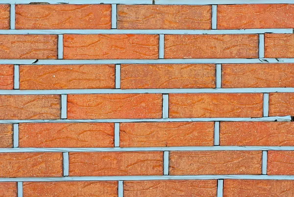 砖墙的结构 新的砖头 展览上展示了墙壁或栅栏的样品 橙色砖块关上了 — 图库照片