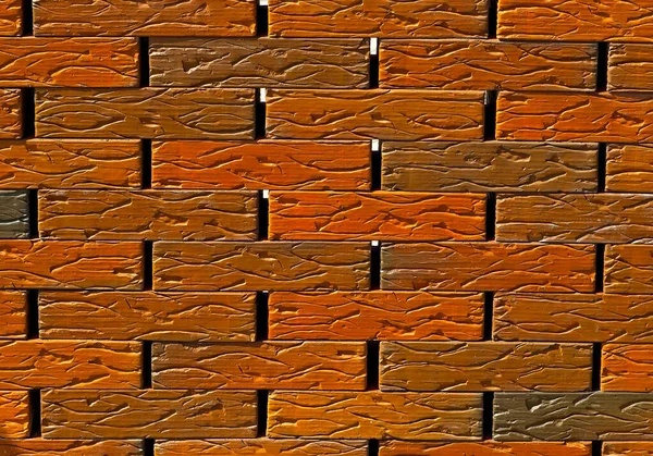 レンガの壁の質感 新しいレンガ工場だ 壁やフェンスのサンプルが展示されています オレンジのレンガを閉じる — ストック写真