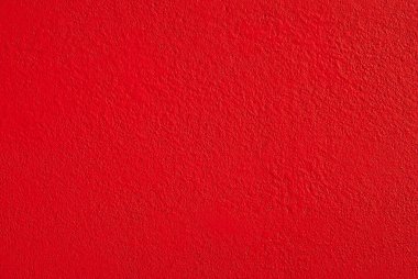 Beyaz bir duvarda alçı. Somut kırmızı dokuyu kapat.