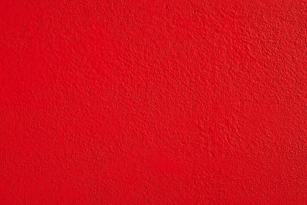 Beyaz bir duvarda alçı. Somut kırmızı dokuyu kapat.