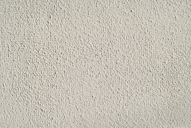 Beyaz bir duvarda alçı. Beton duvar dokusu kapat.