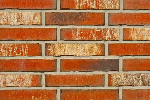 조각들 새로운 벽이나 울타리의 전시회에 전시되어 오렌지 벽돌을 가까이 — 스톡 사진