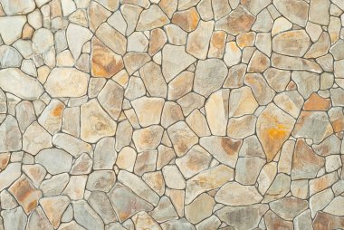 Tuğla duvar ve beton bloklar. Sıraya dizilmiş taş levha örnekleri.