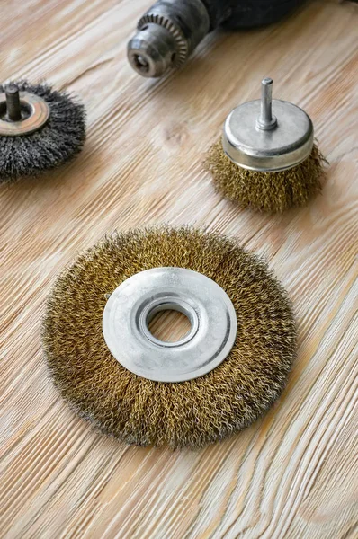 abrasive tools for brushing wood and giving it texture. Wire brushes on treated wood