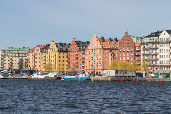 Stockholm, Sweden - April 21 2019: the view of colorful buildings on Kungsholmen waterfront in a sunny day on April 21 2019 in Stockholm Sweden.