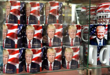 New York, USA - June 10, 2018: A cup with a picture Donald Trump in the gift shop in New York. clipart
