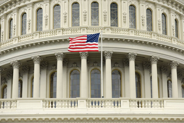 US flag on the dome of United States Capitol Building